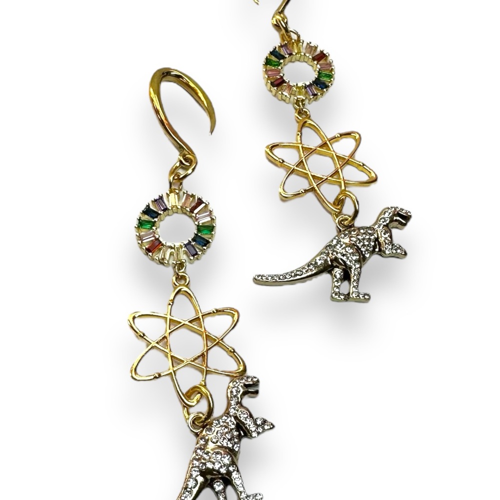 Jury ain’t out in science T REX earweights dinosaur nucleus scientist atom plugs